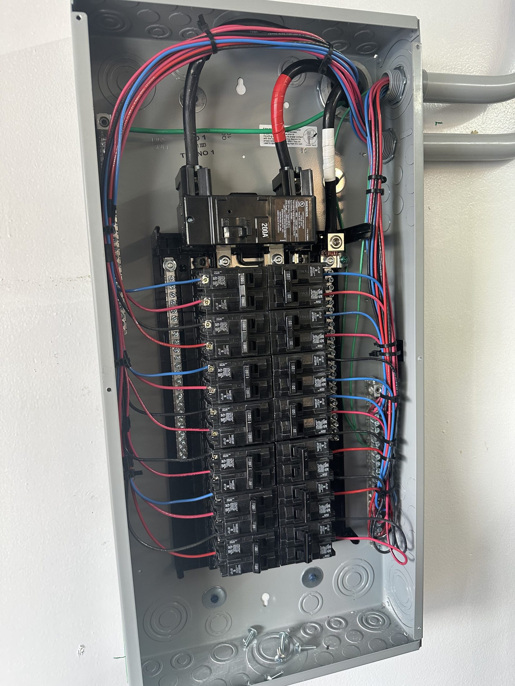 Clean 200 amp residential electrical panel installation